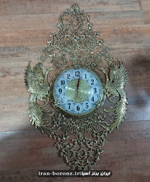 ساعت دیواری برنجی مدل طاووس بزرگ پر کار