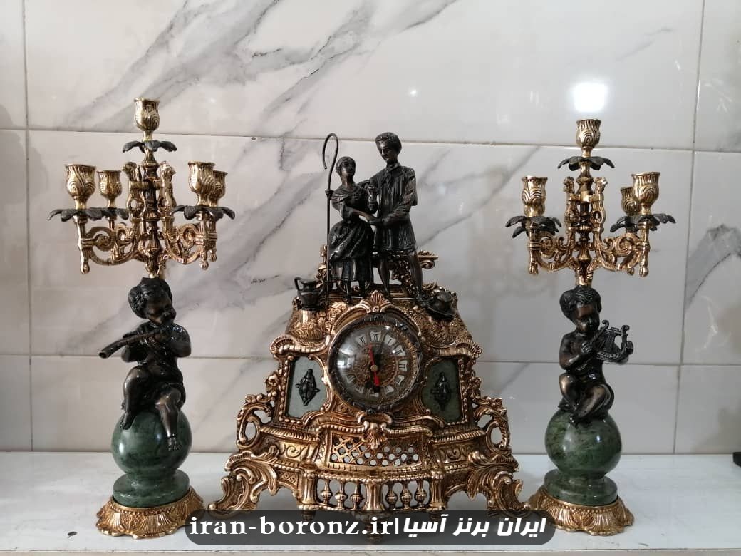 ساعت شمعدان برنزی مدل آدم و حوا