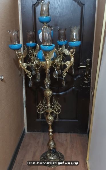 کنار سالنی لوستری روشنایی برنزی